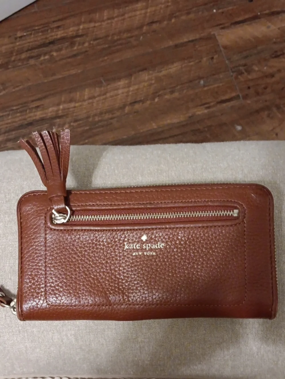 kate spade Brown Tassel Zip Around Leather Wallet
